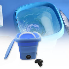 Detailed view of mini washing machine, ideal for small loads and travel.