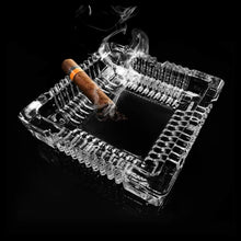 Crystal ashtray with square shape for home decor.