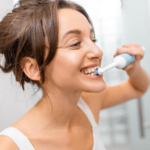 Electric toothbrush for travel with 1 extra brush head and batteries