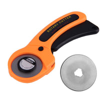 Manual sewing roller cutter with comfortable grip and rotary blade